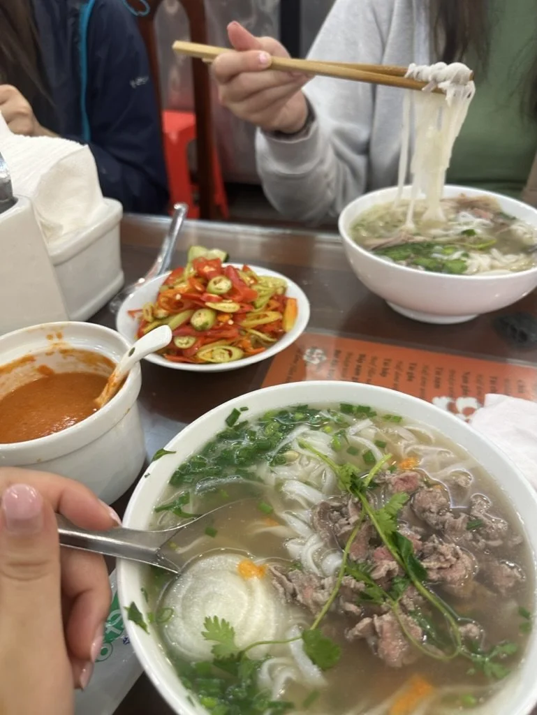 Pho in Hanoi- light, simple, broth-heavy, comforting