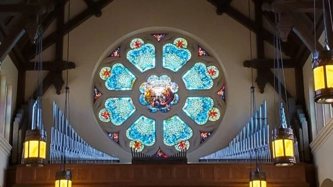 Rose window and organ pipes inside St. Paul’s Episcopal Church in Milwaukee.