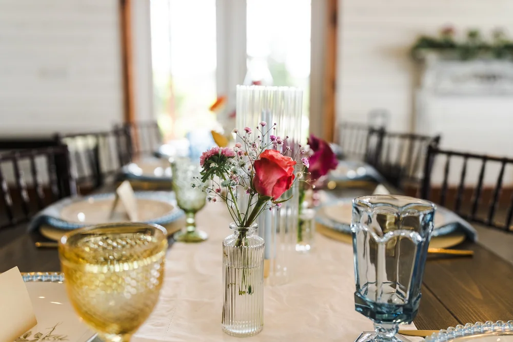 Wedding reception table details photographed by Luther Studios
