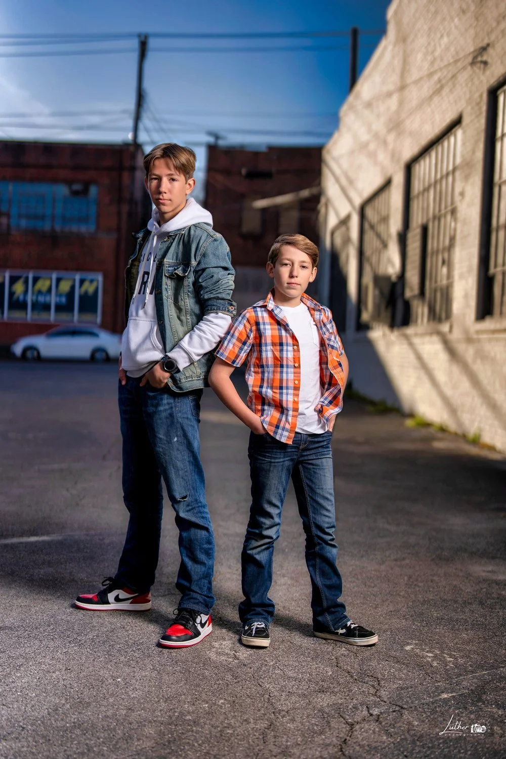 Parent and child in an urban portrait