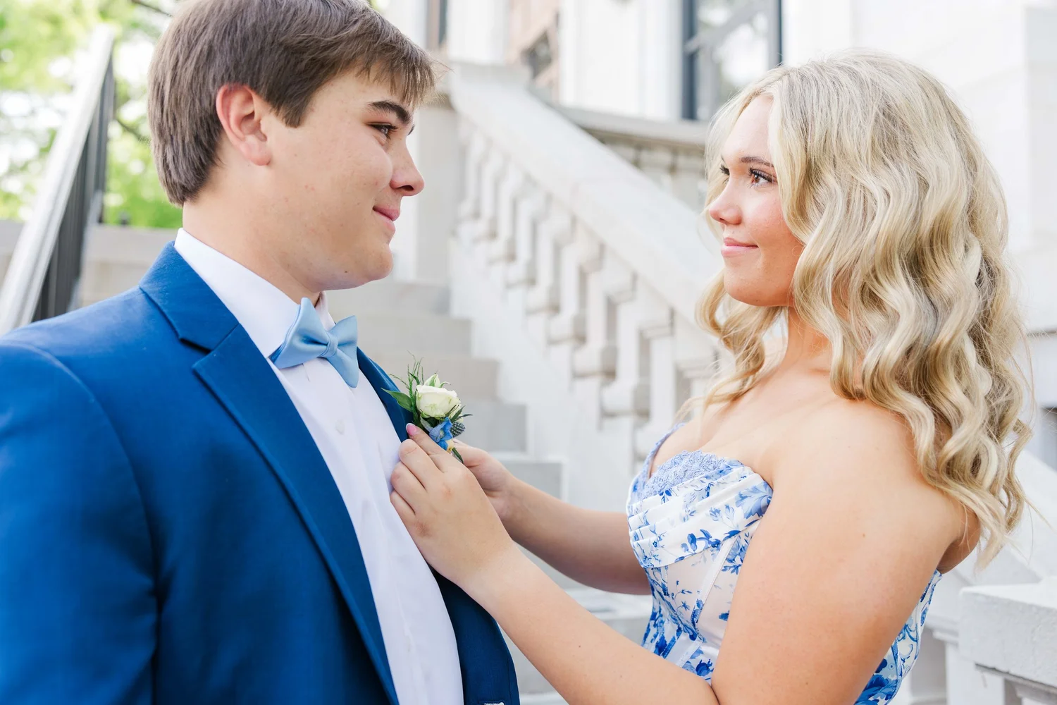 Prom couple sharing a close moment