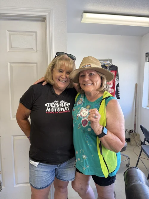 Debbi Tamietti receiving the Glen Helen Challenge Coin