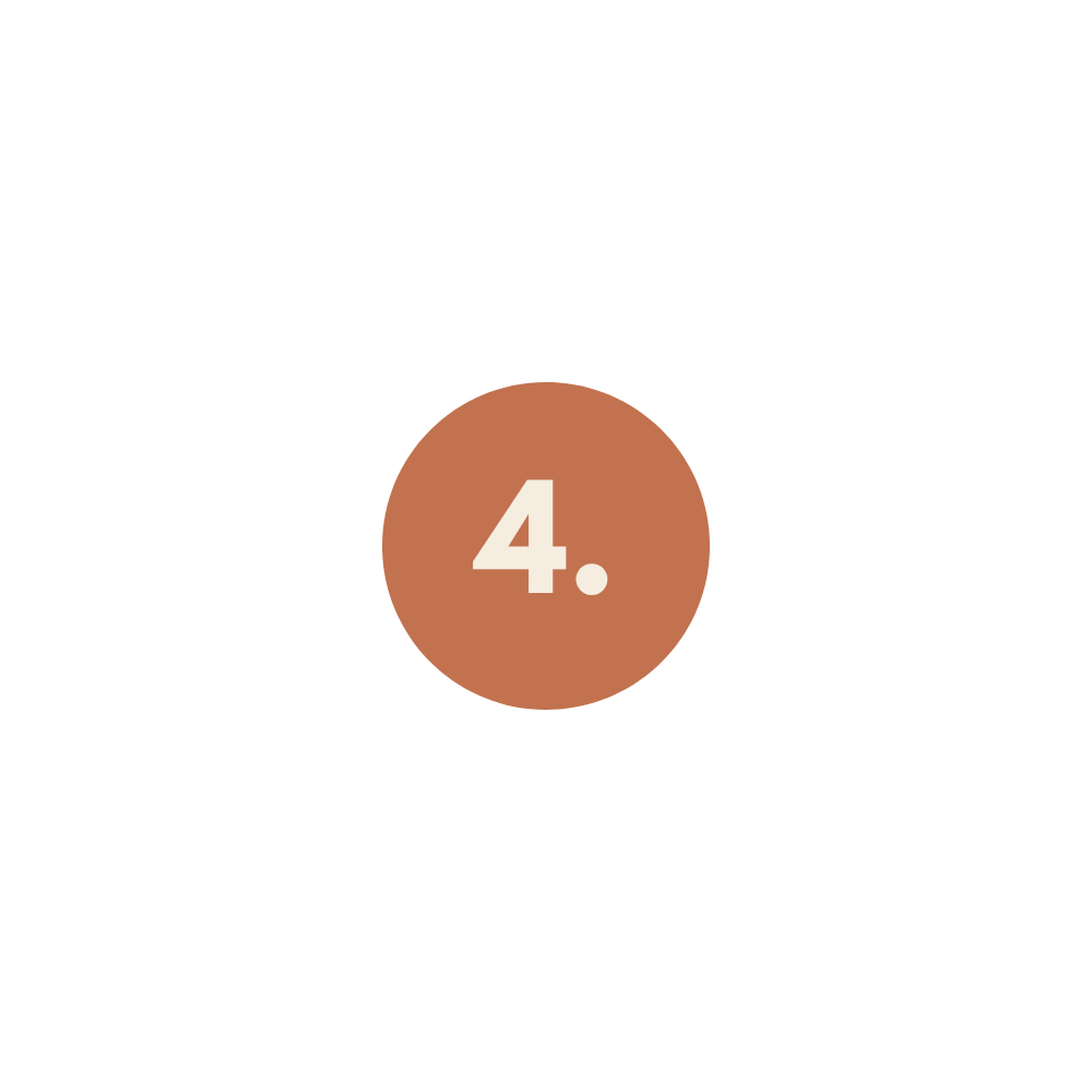 A clock showing 4:00 with a brown circle and white numbers, black hour and minute hands, and a black second hand.