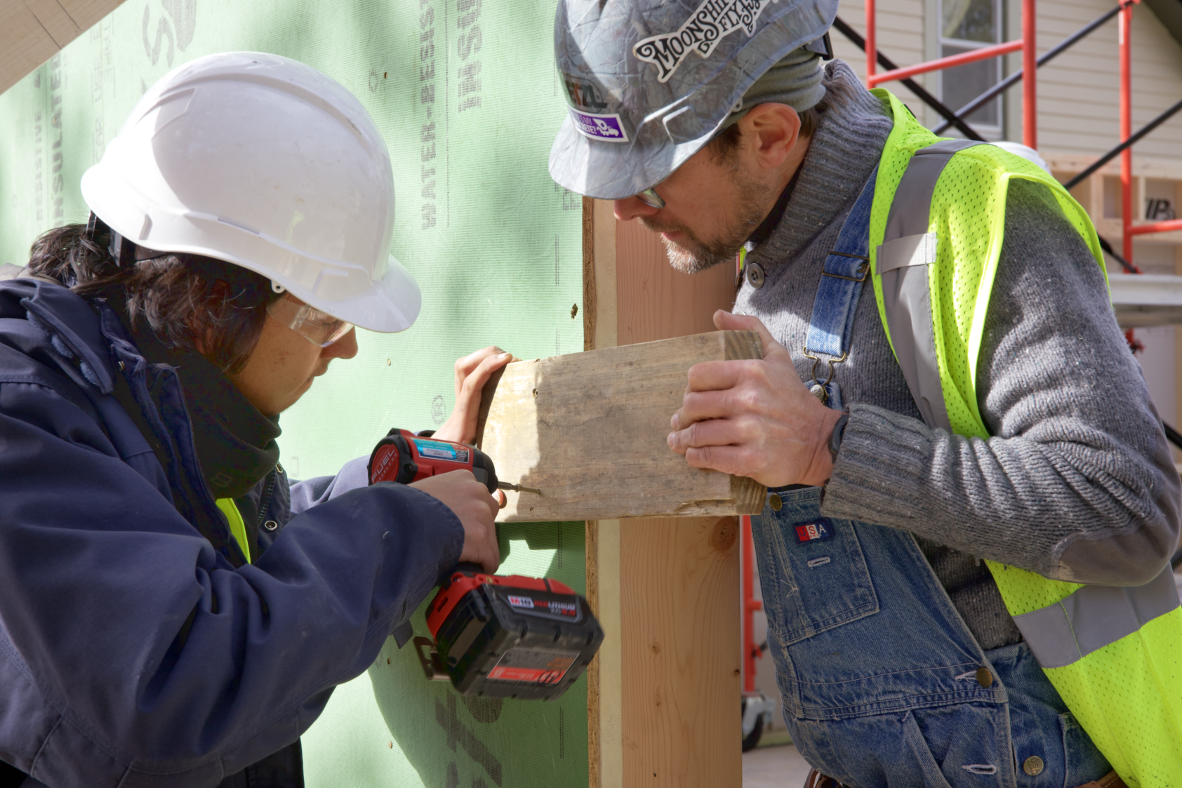 Screwing in board.png