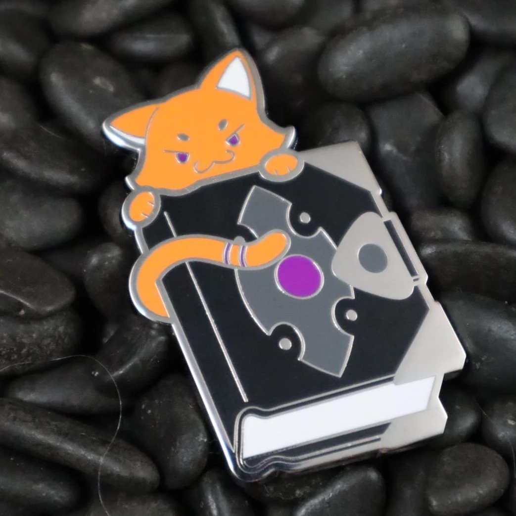 enamel pins_catbook.jpg
