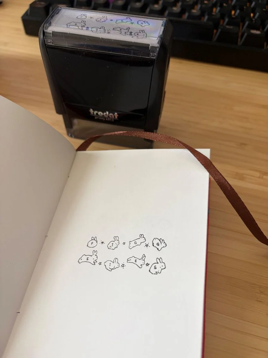 I designed this stamp so that even if guests didn't purchase anything from me, they could still take something home with them. The running bunnies spell out FIGGSIES, and it doubled as my "business card" when guests asked for more information about m