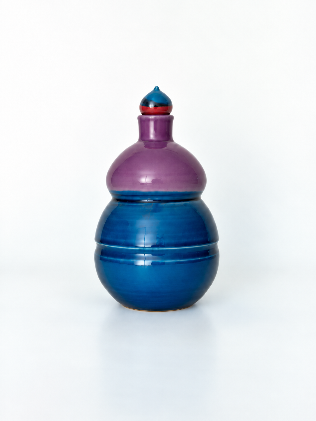 Aceitera azul y violeta