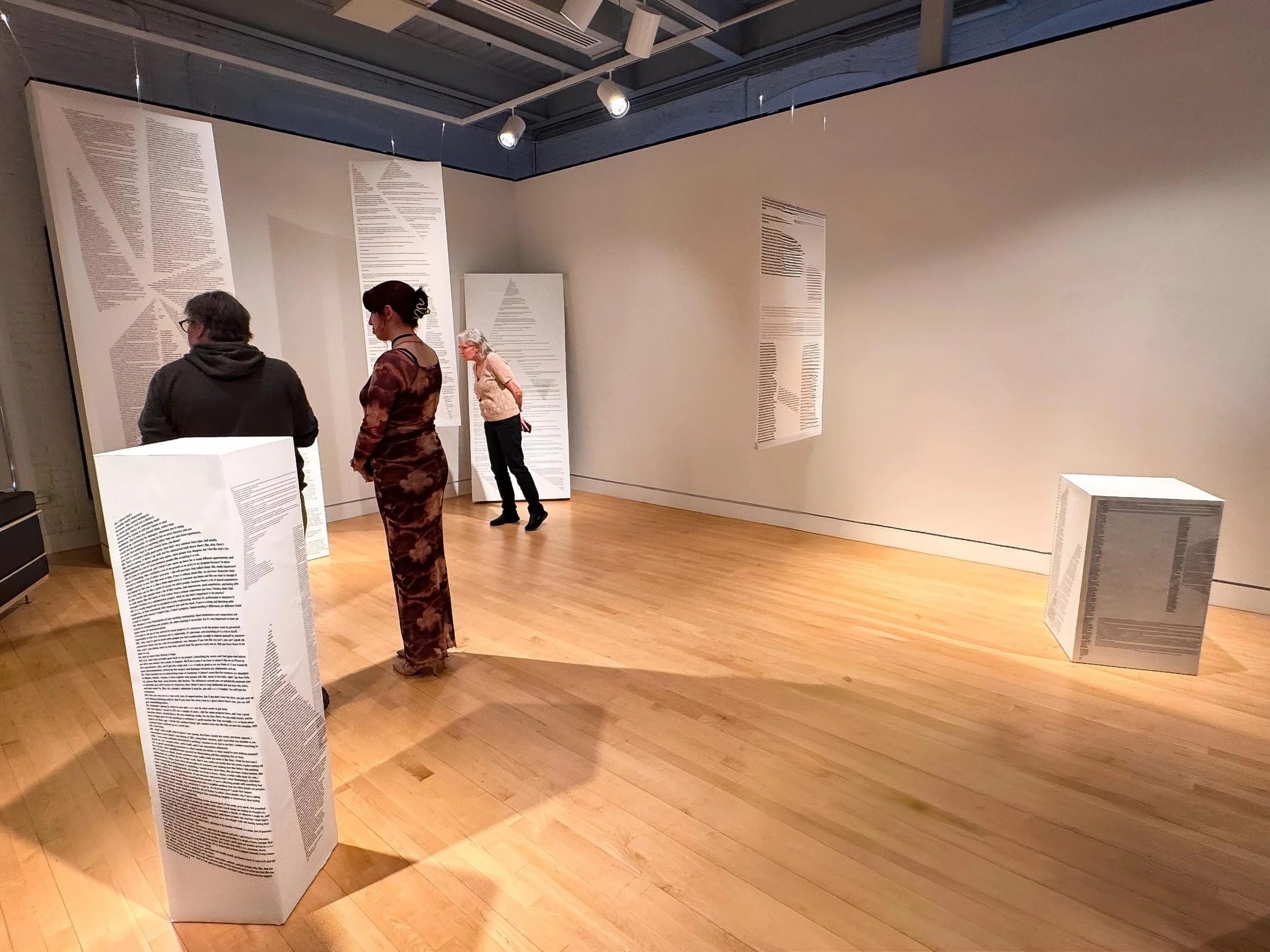 Samantha Grimwood
CityScape: Layers of Expression, 2026
Conversation, Pillars, Transcripts, Text, Canvas

CityScape: Layers of Expression is a socially engaged project grounded in direct community engagement, the intersection of media and practice th