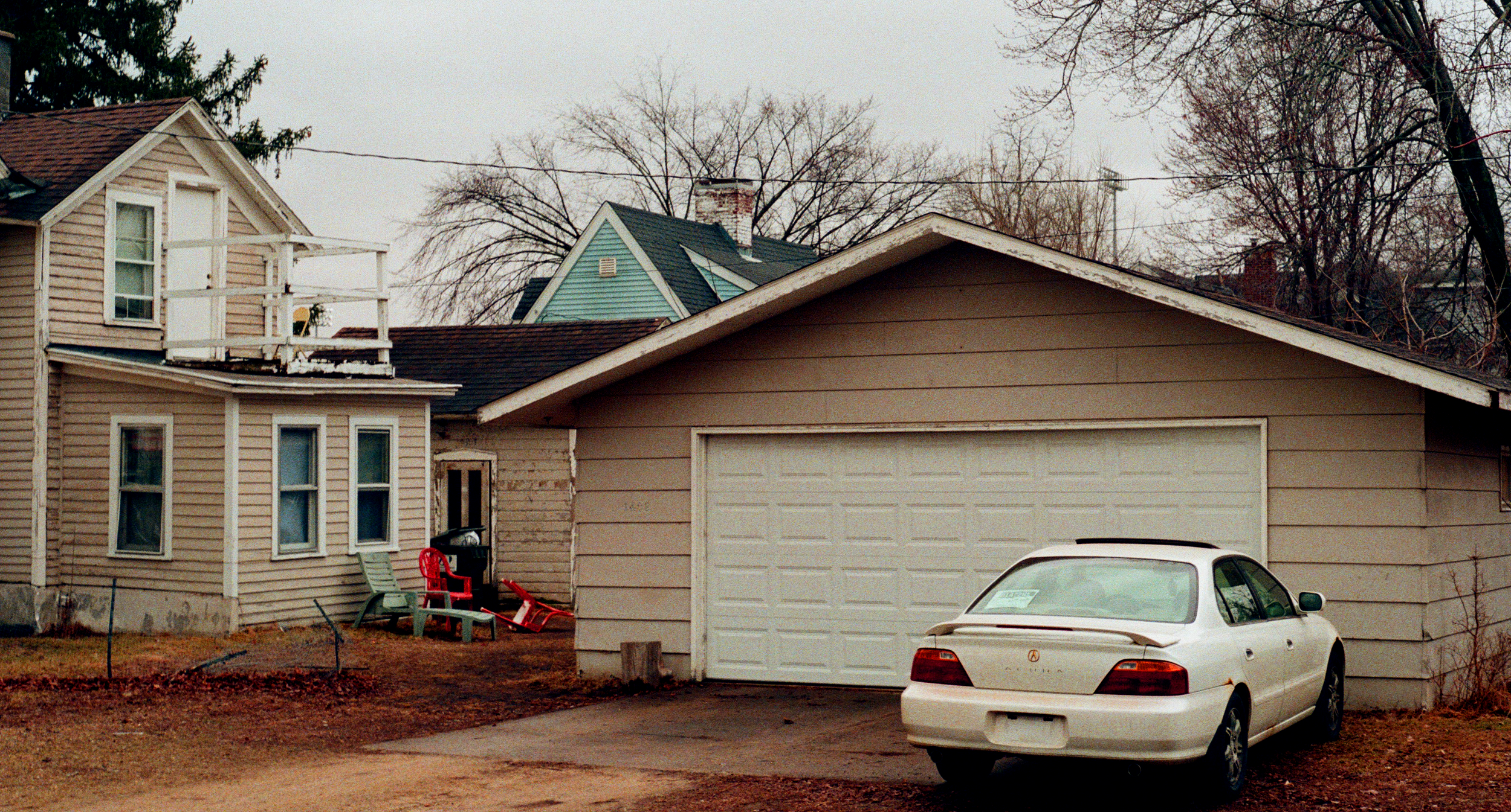 A car parked outside a house