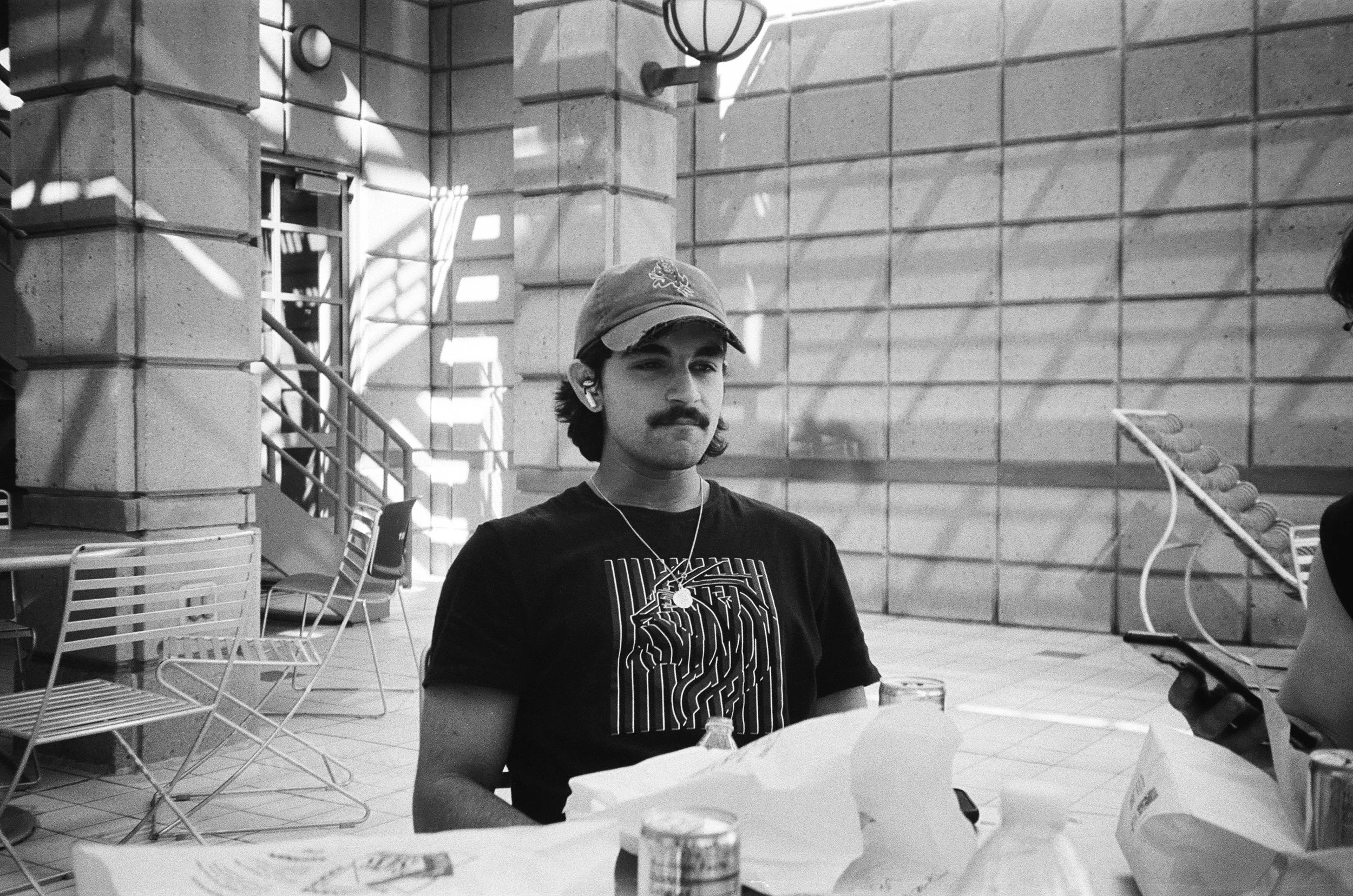 A man sits enjoying lunch