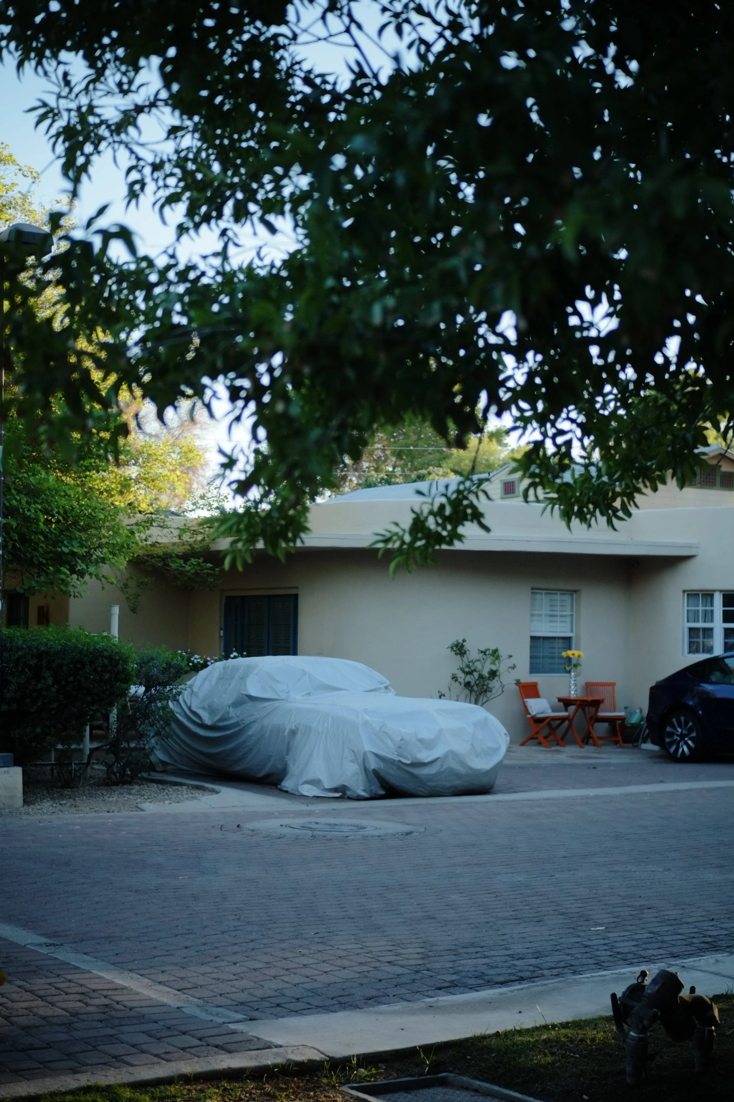 A car under a tarp