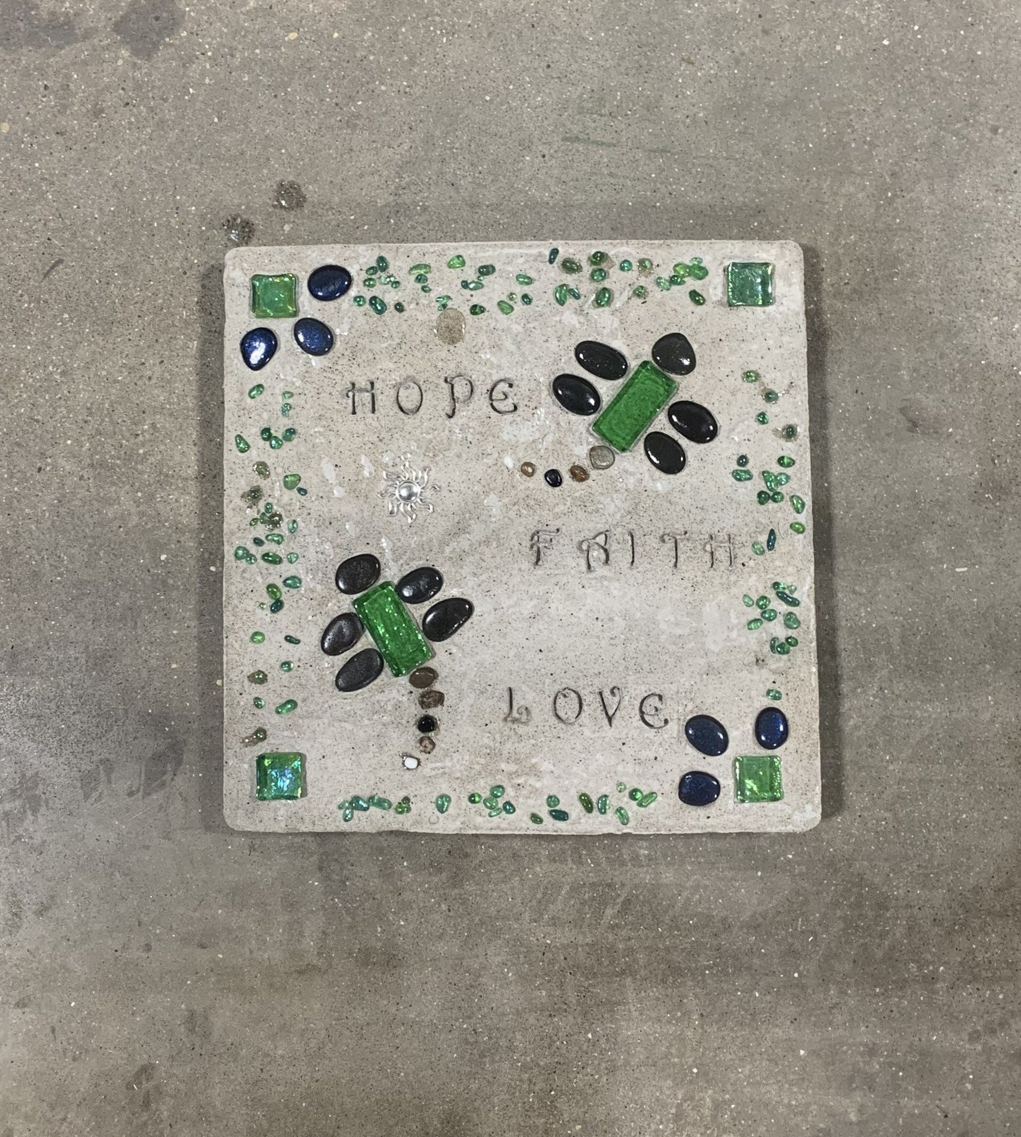 Workshop price $45
Hope, Faith, Love Stepping Stone
Create this beautiful stepping stone designed with stones, and mirror chips