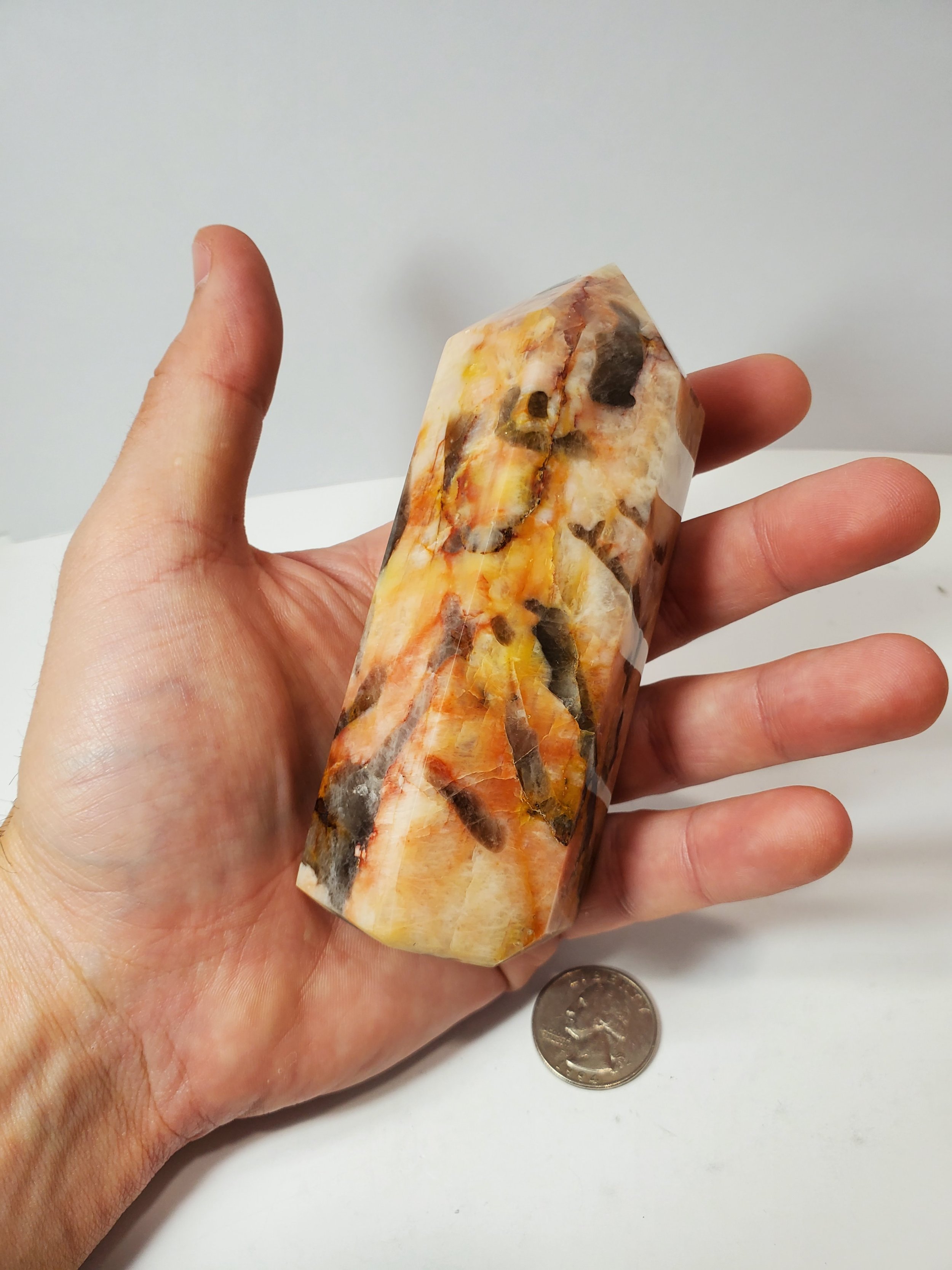 Mixed Peach Moonstone Quarter Hand.jpg