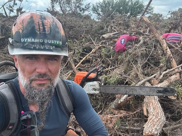 Dusty with Chainsaw - Hunt Flood Recovery.jpeg