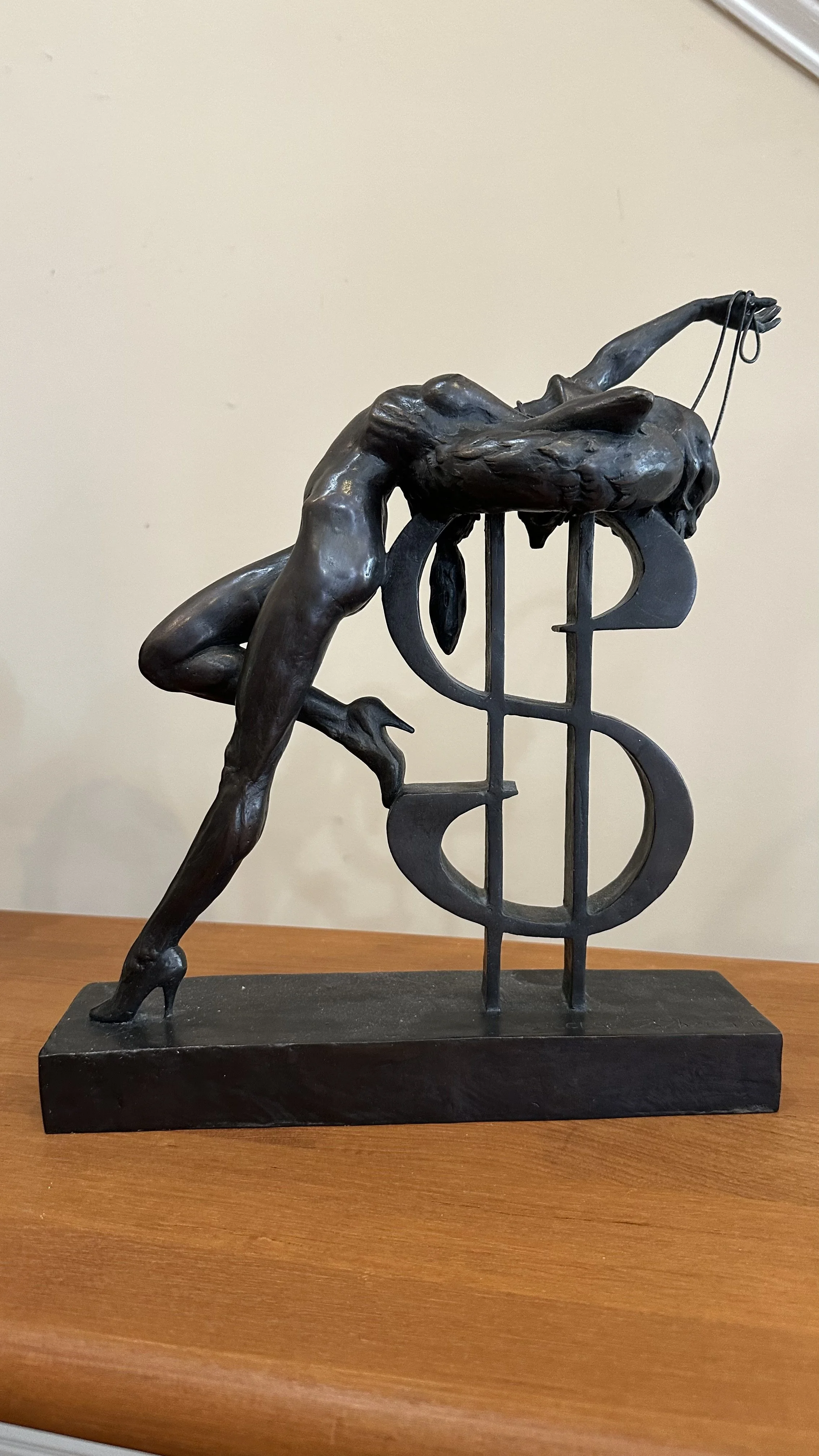 Estate sale Ayn Rand inspired cast bronze sculpture featuring a nude, a dollar sign, heels, and pearls.