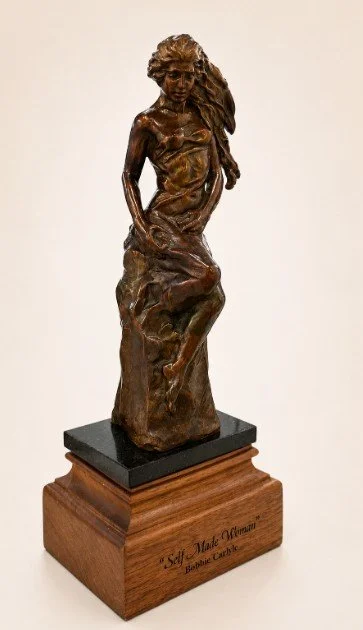 Self-Made woman sculpture in bronze