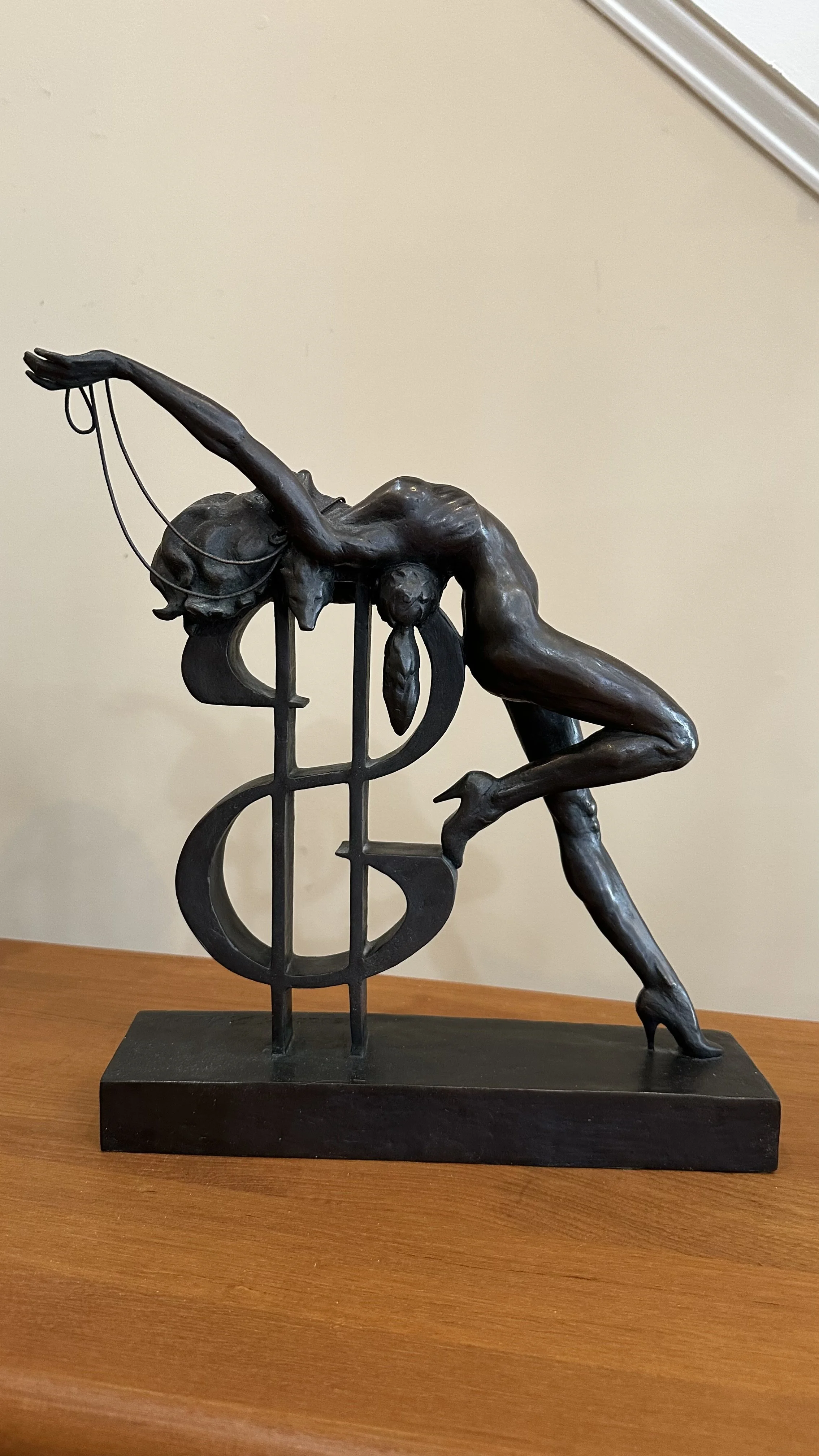 Estate sale Ayn Rand inspired cast bronze sculpture featuring a nude, a dollar sign, heels, and pearls.