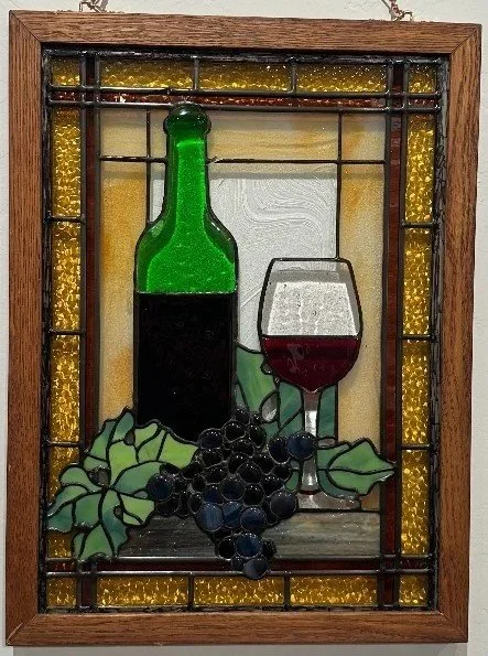 stained glass wine bottle, wine glass, and grapes by Jon Wos
