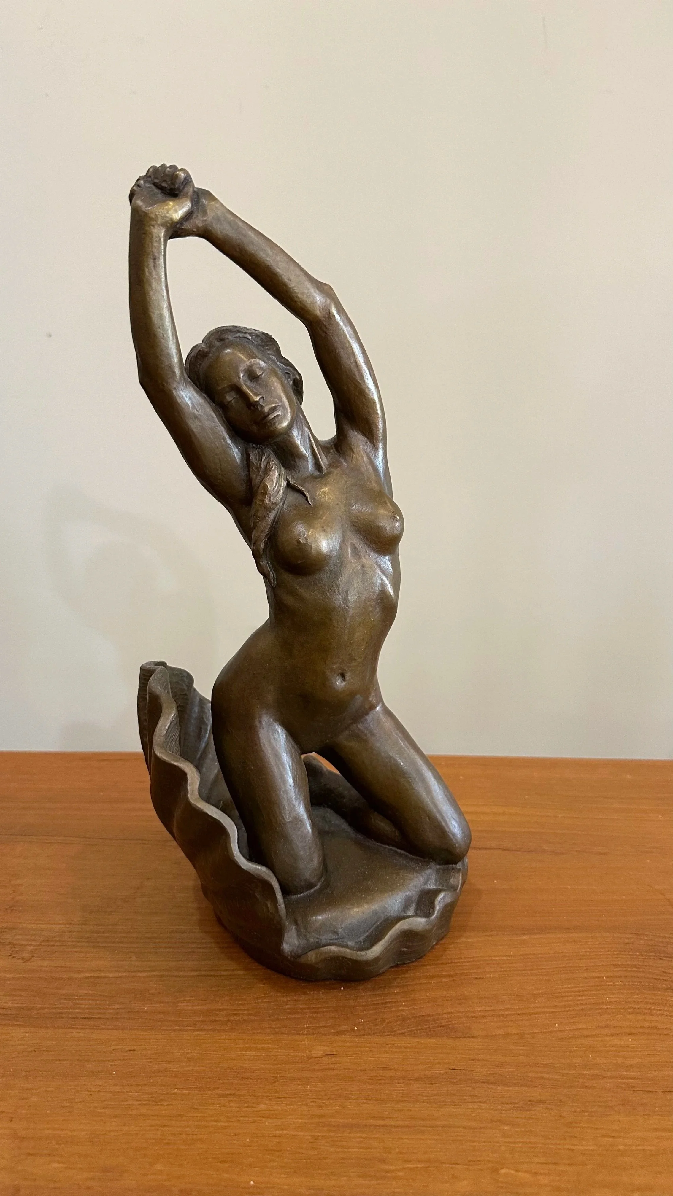 Venus, the goddess of love and beauty arriving on land, on the island of Cyprus, born of the sea spray and blown there by the winds