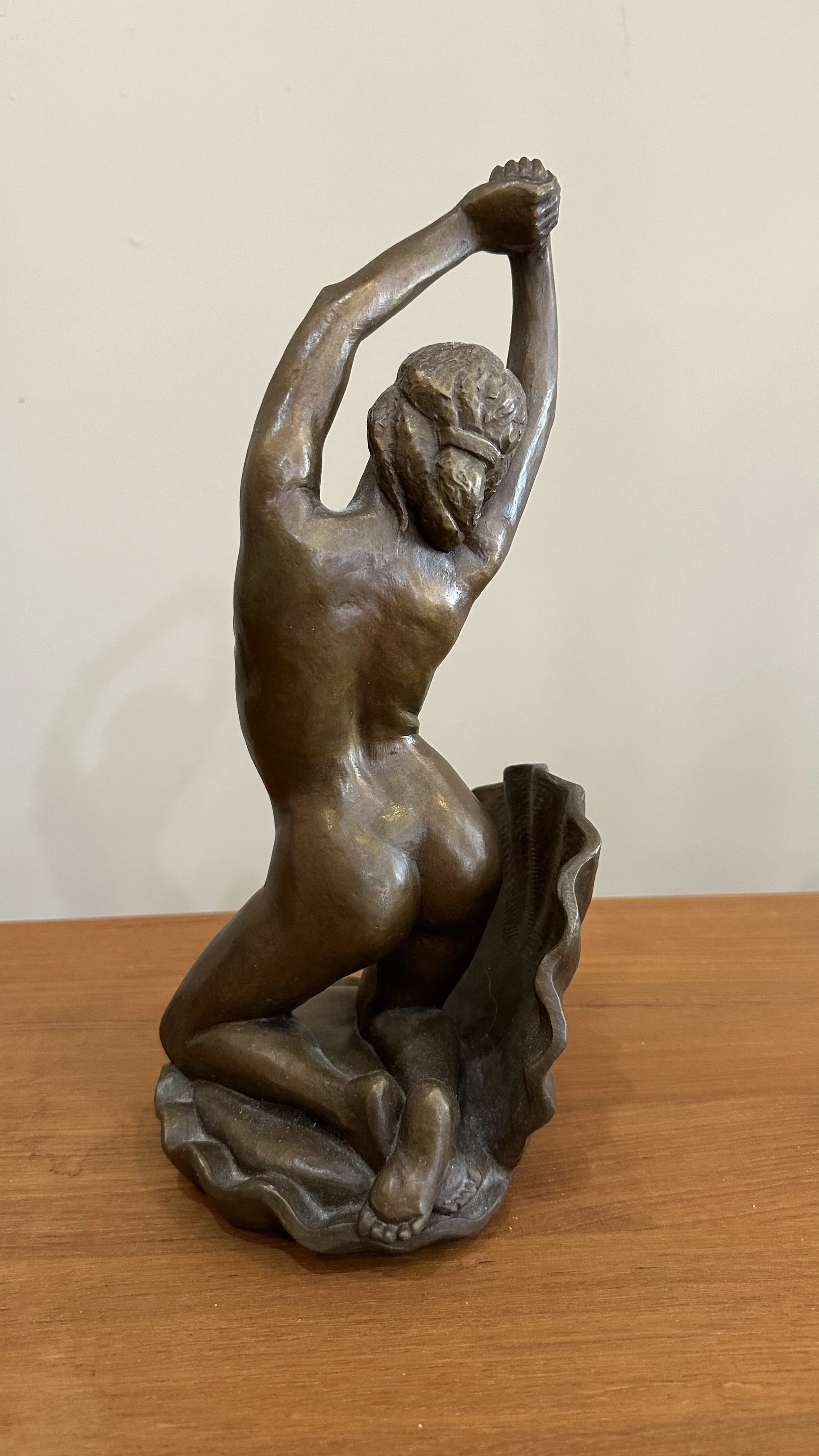 Venus, the goddess of love and beauty arriving on land, on the island of Cyprus, born of the sea spray and blown there by the winds