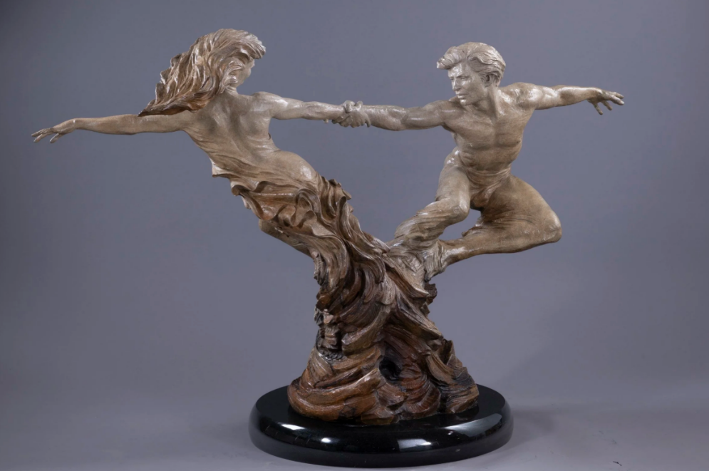 bronze of a couple spinning