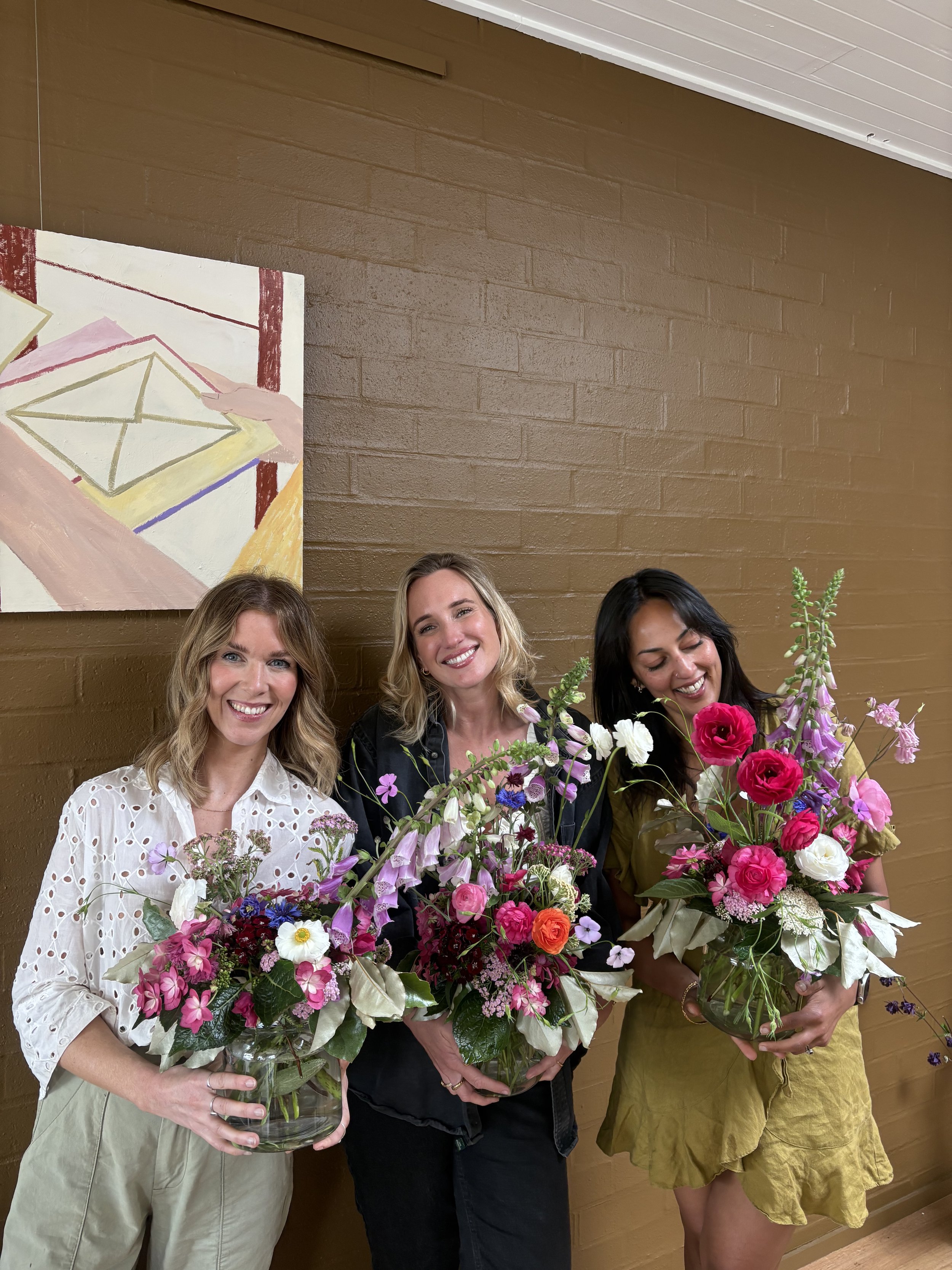 ladies enjoying flower arranging workshop
