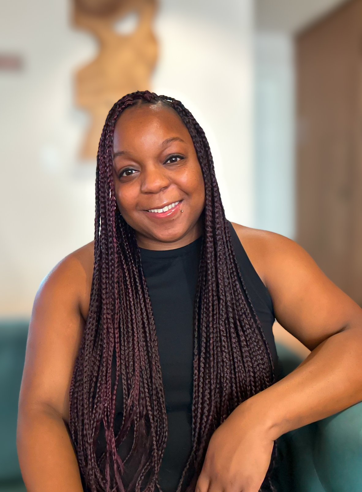 Headshot of Brionna Otte, LMFT, a Black sex and relationship therapist in California.