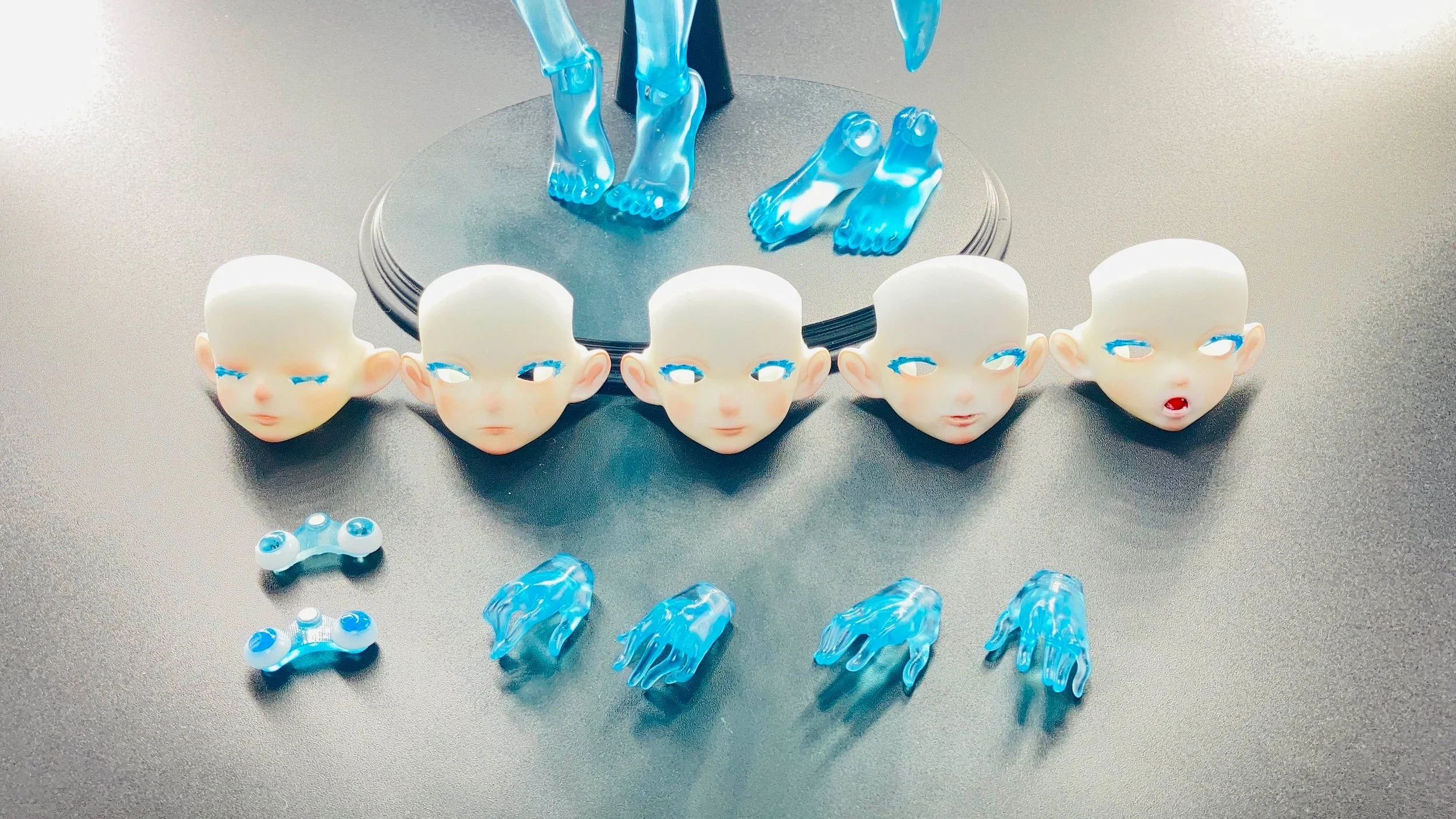 Face-plates in order: Sleeping, neutral, smile, open mouth, shocked