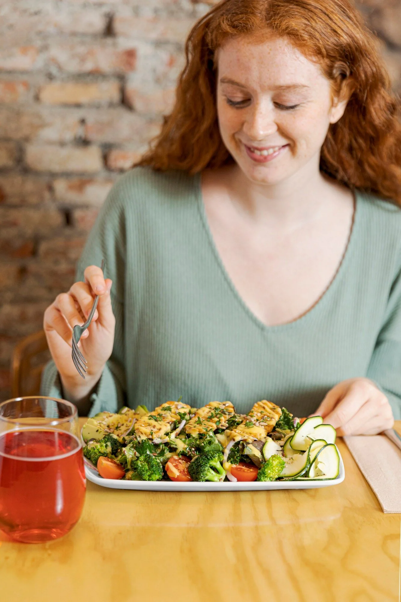 woman-eating-vegetarian-food-medium-shot_23-2148899027.jpg