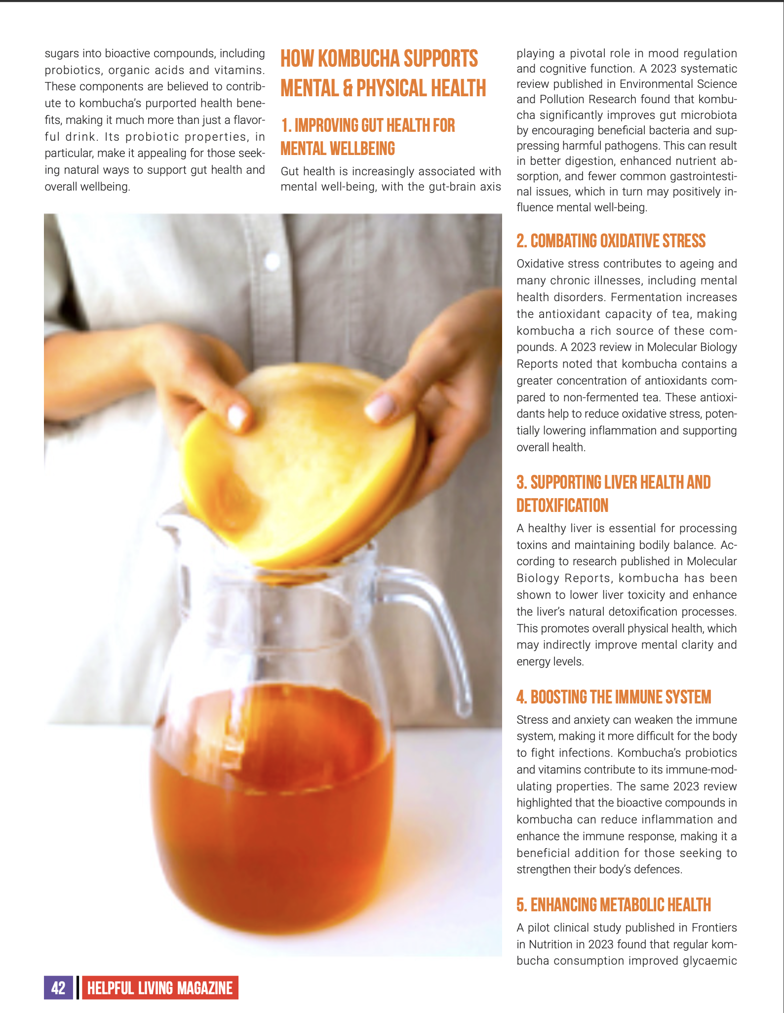 Open magazine page discussing the benefits of kombucha with a photo of a person pouring kombucha into a pitcher.