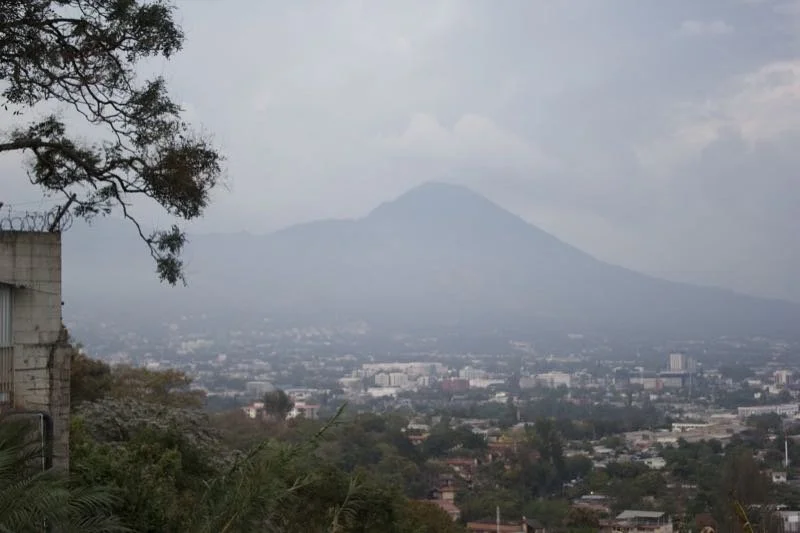 Cityscape with mountain in haze