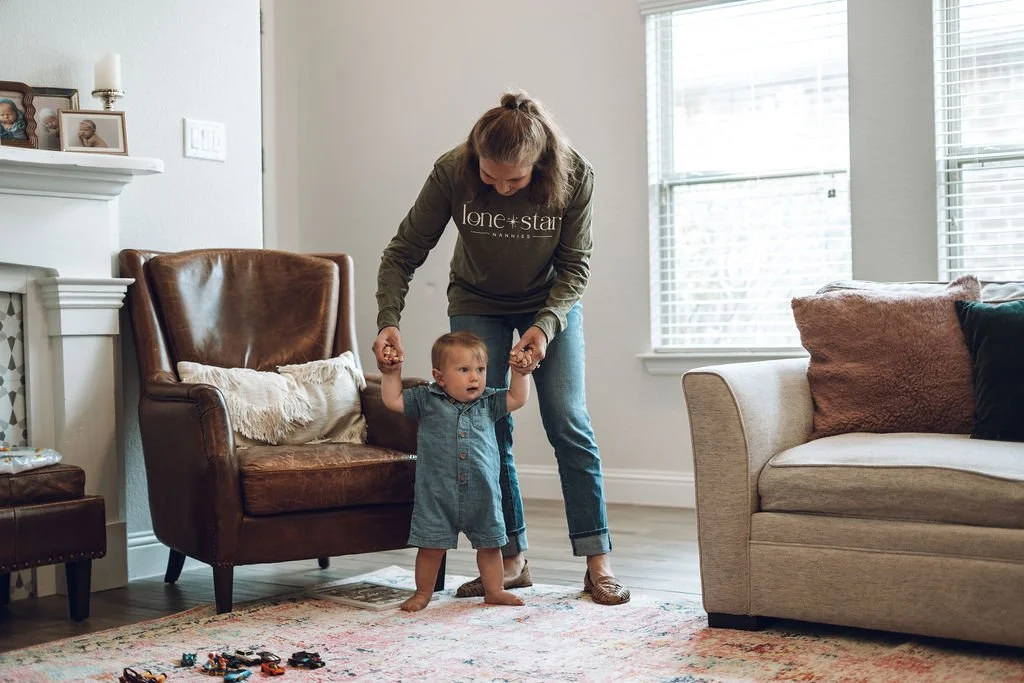 Lone Star Nanny practicing walking with a baby