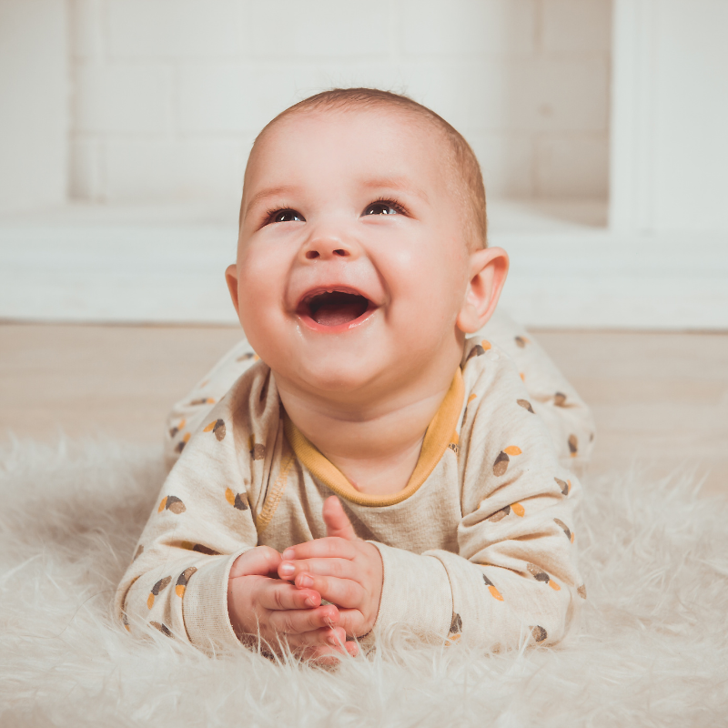 Happy baby in a warm, comfortable and energy-efficient home environment