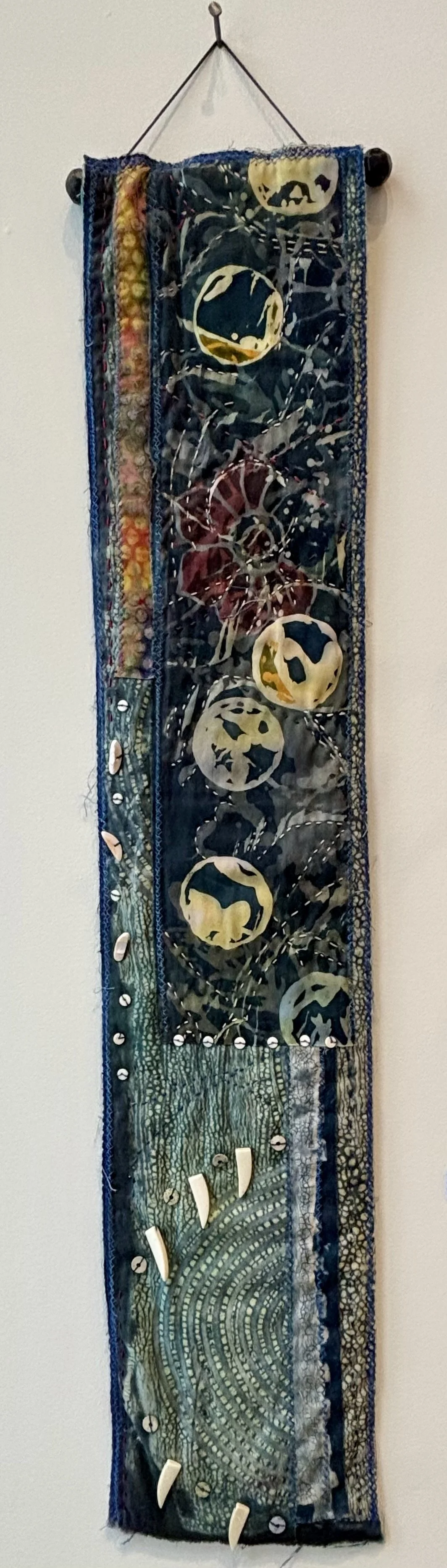 Many Moons by Kris Worthington, textile collage 35 x 8 inches