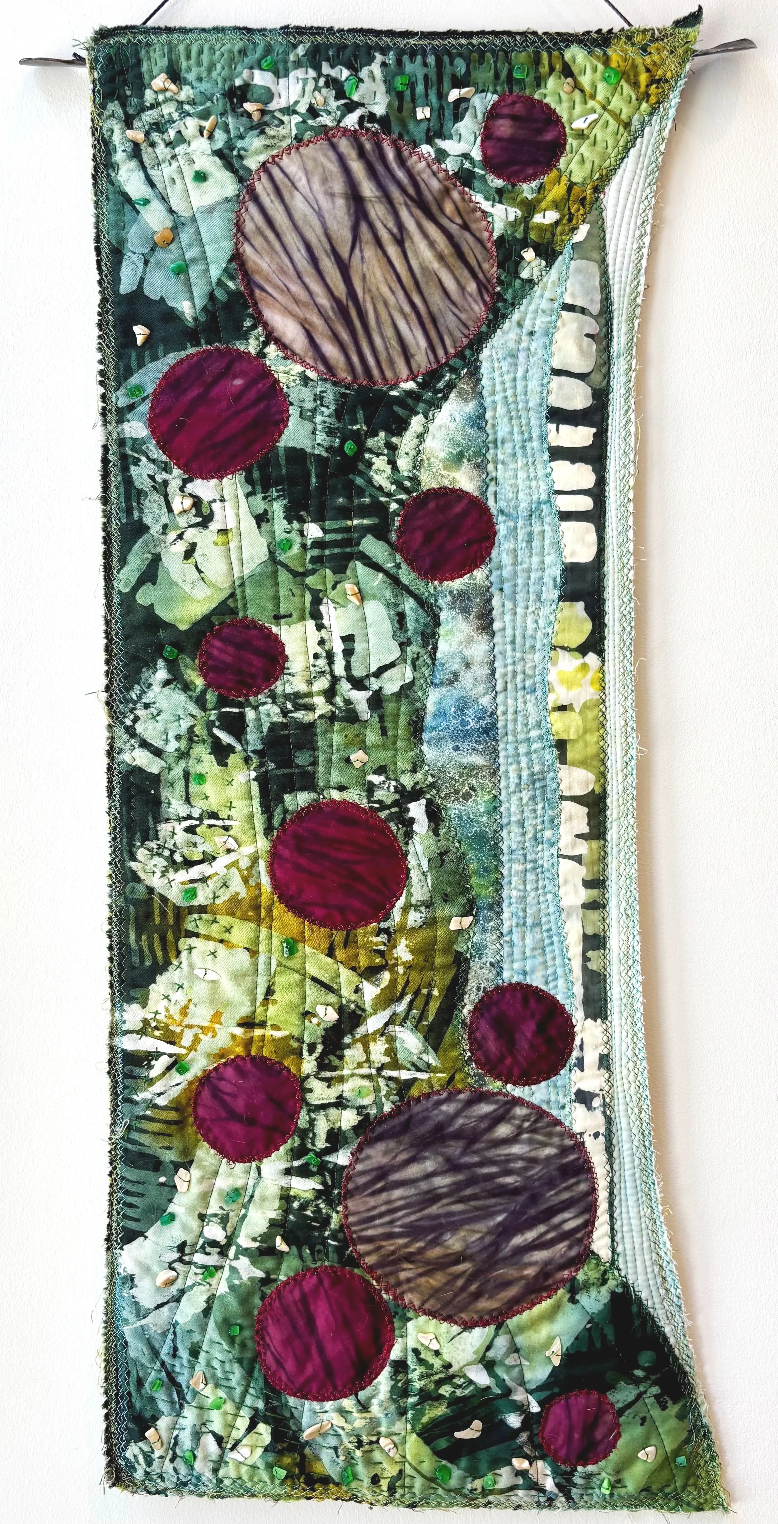 Green Ocean Moons by Kris Worthigton, textile collage 28.5 x 13 inches