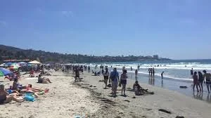 Scuba diver entry and exit at La Jolla Shores for guided scuba tours and private scuba instruction.