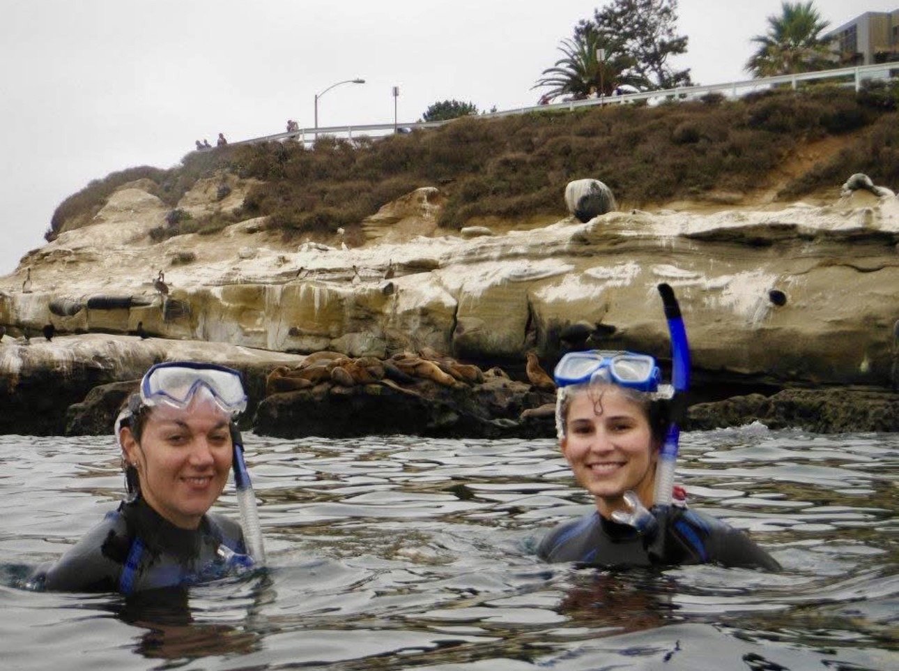 Two visitors enjoying a snorkel tour in La Jolla with Scuba with Justin in San Diego.