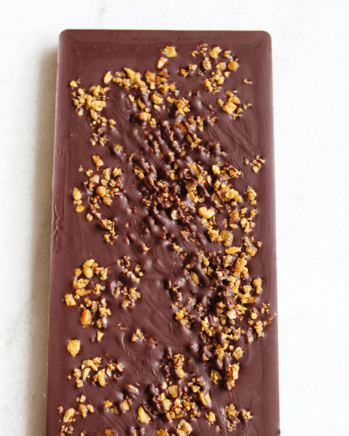 Back of a chocolate bar infused with nuts.