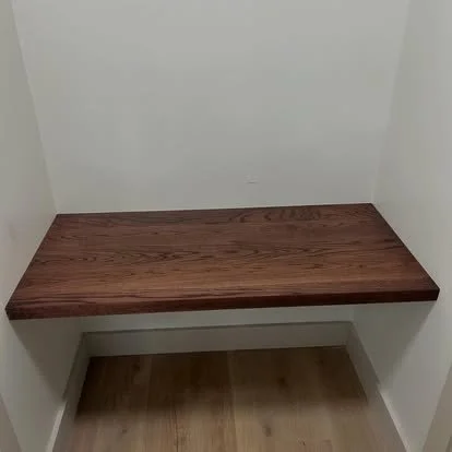 Built in self and desk top for stage in an office building.