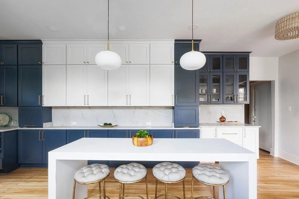 Kitchen island with woven counter stools