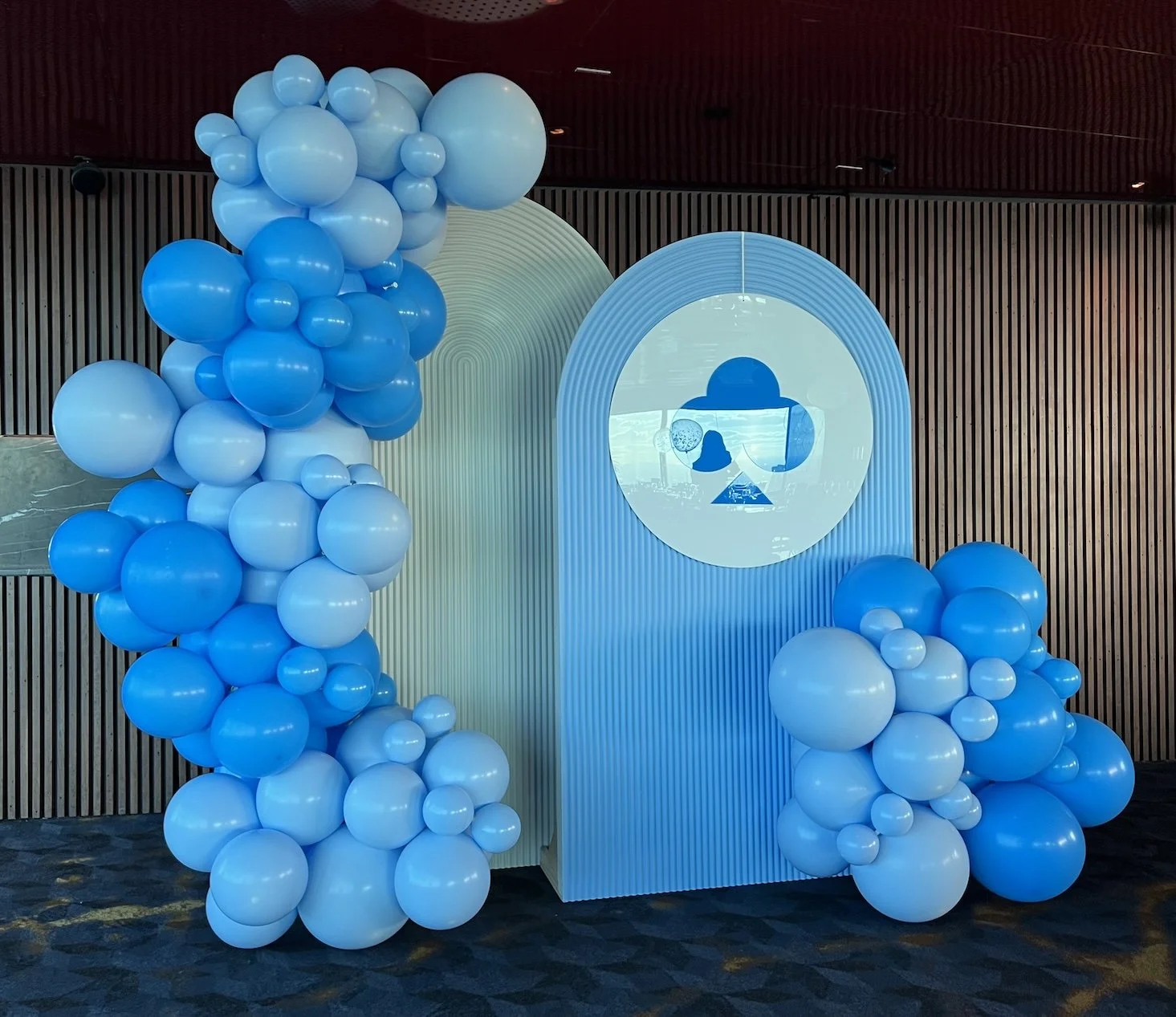 Easy Go Gaming's End of Financial Year party:
They wanted a concept that was fun and colour to suit their company's personality. 
We came up with this concept that includes trending ripple arches. We custom painted one of them blue to suit their comp