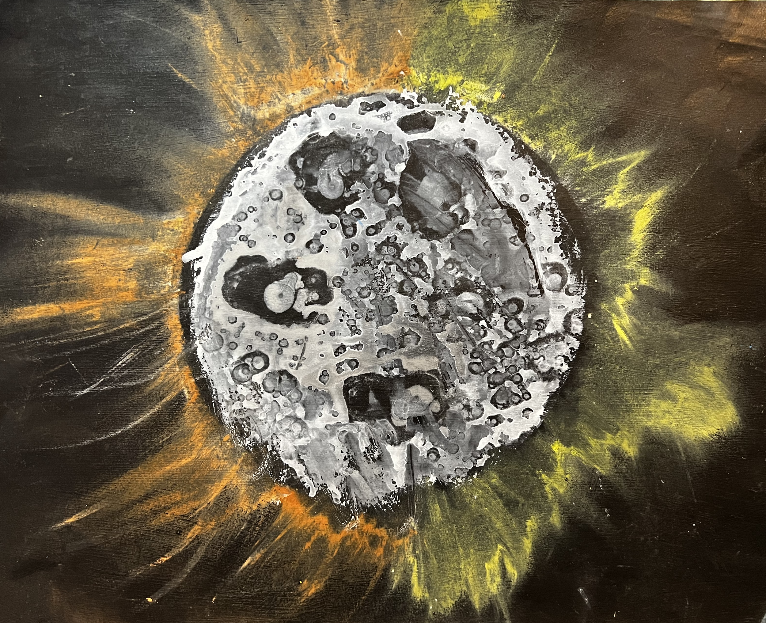 Cratered face of the moon, with a yellow and orange corona erupting behind it