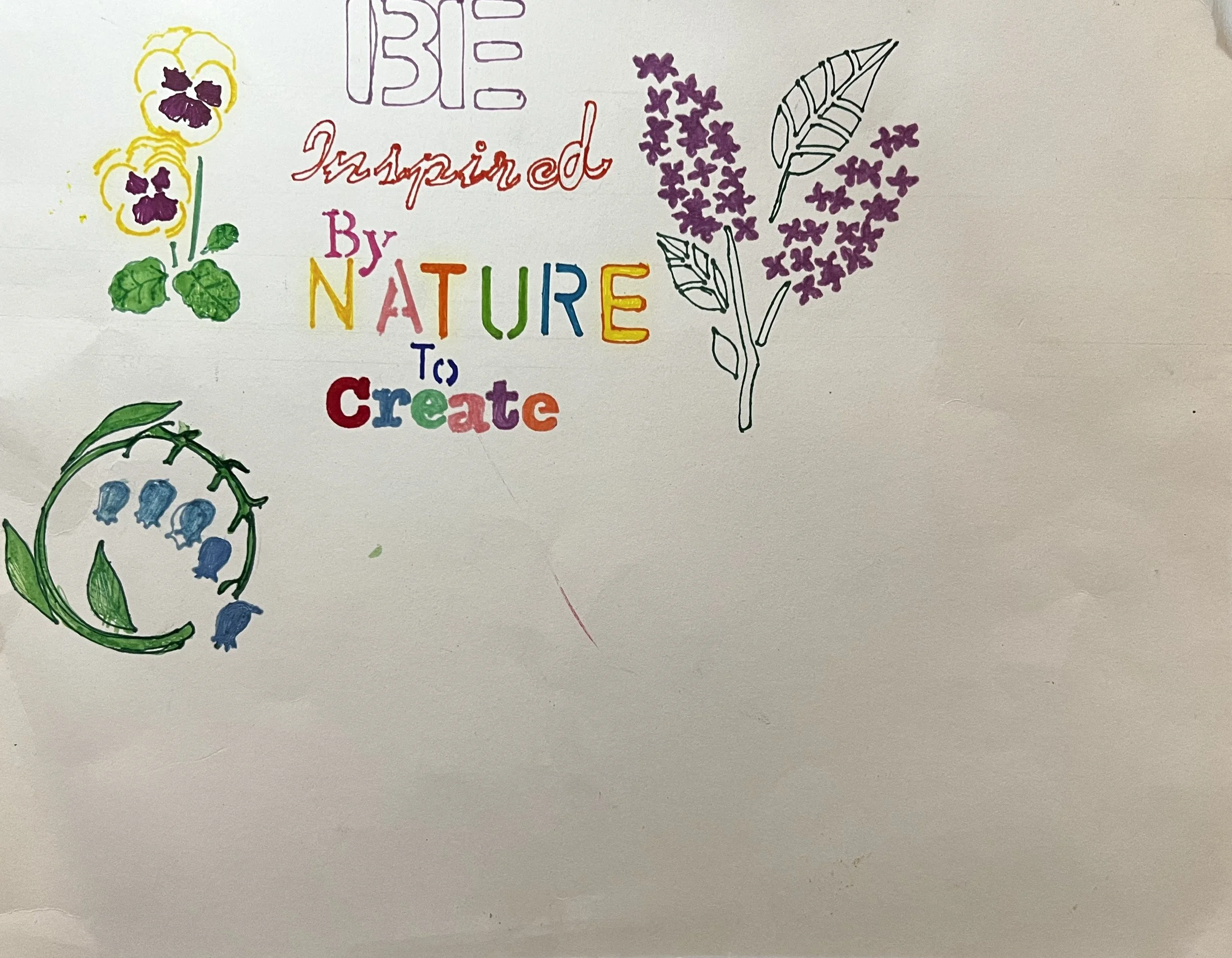 Drawing of flowers with the text: "Be inspired by nature to create"