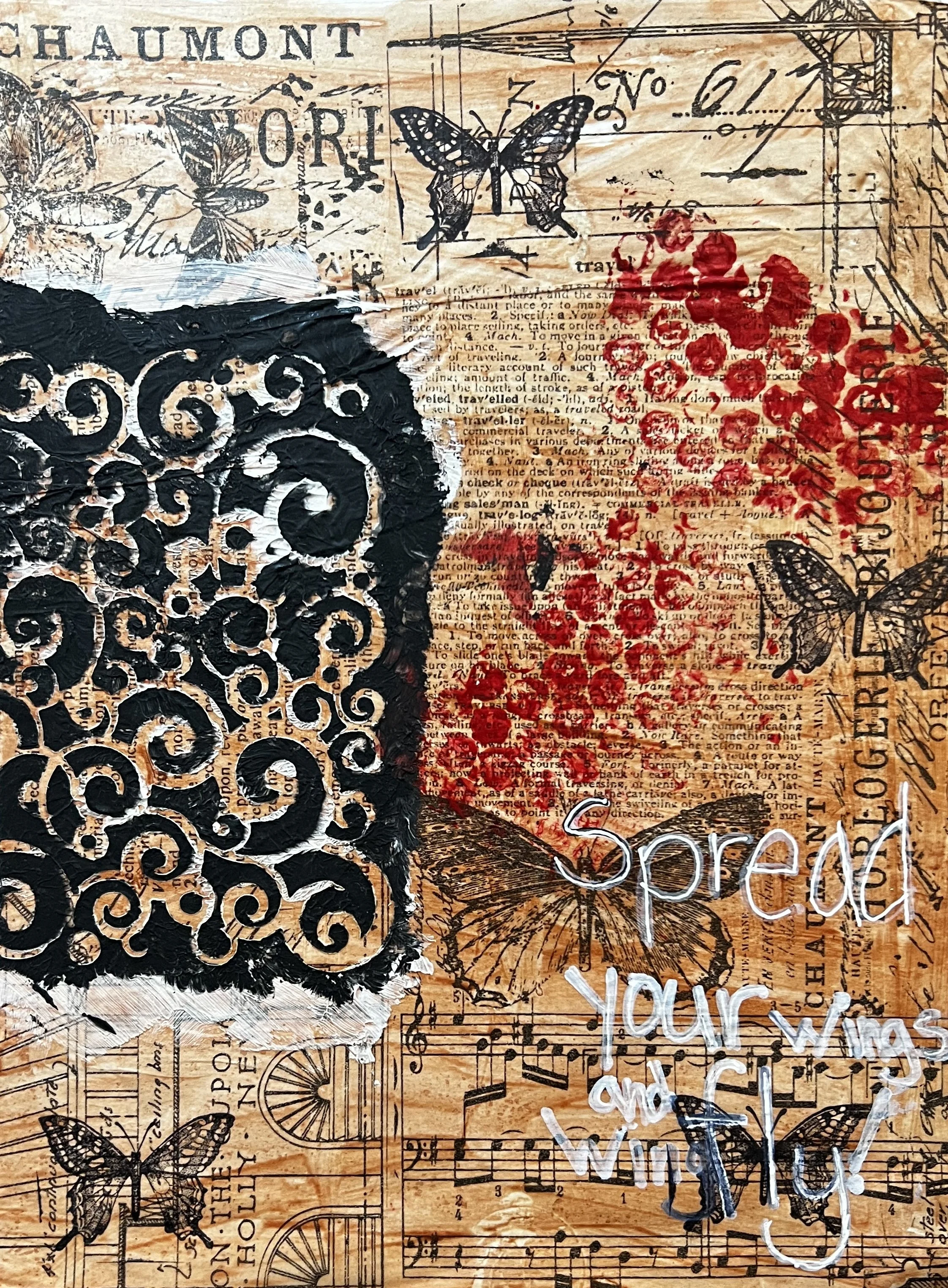 Butterflies and abstract patterns stamped on sheet music, with painted text:"Spread your wings and fly"