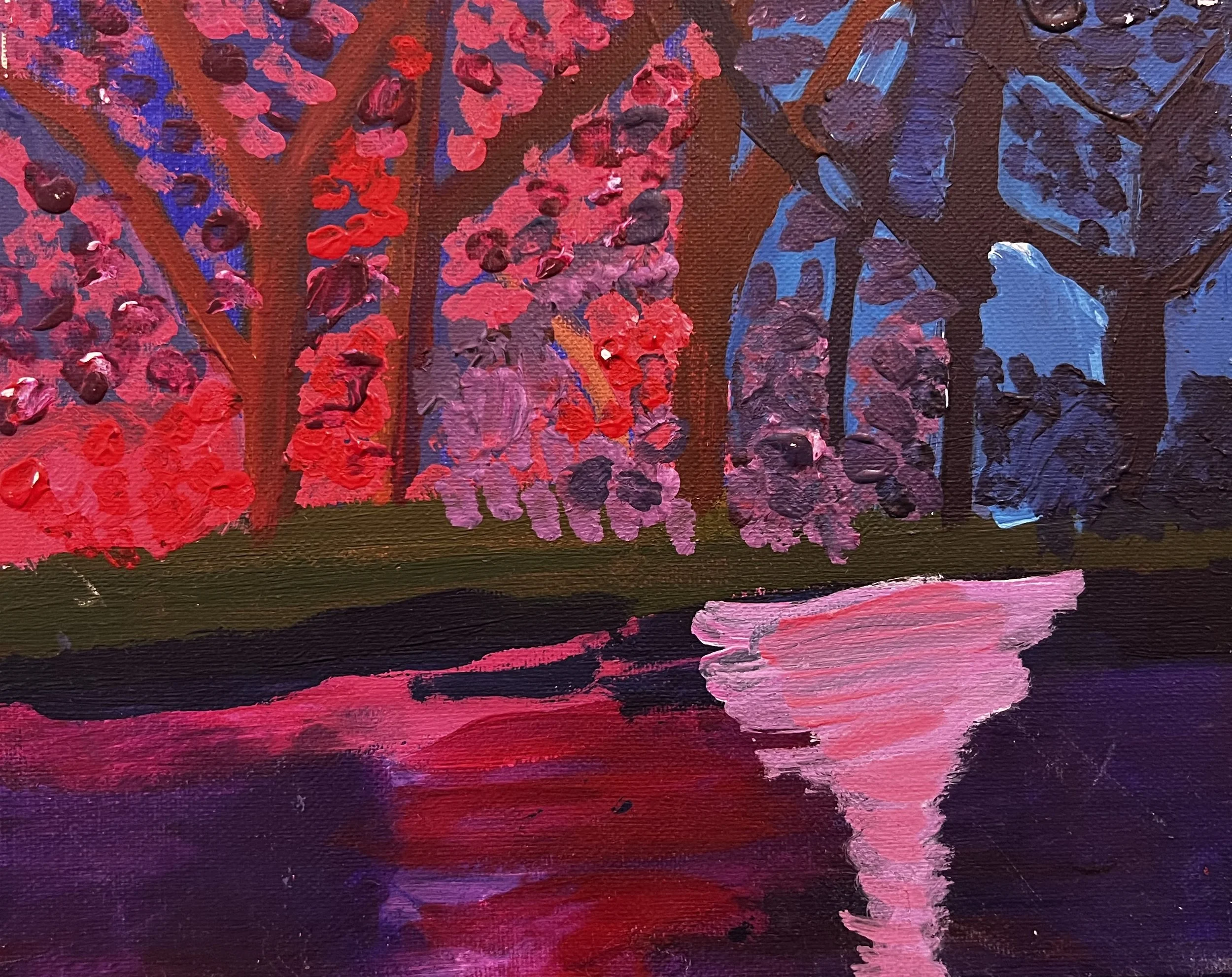 Sunset forest landscape reflected in a lake