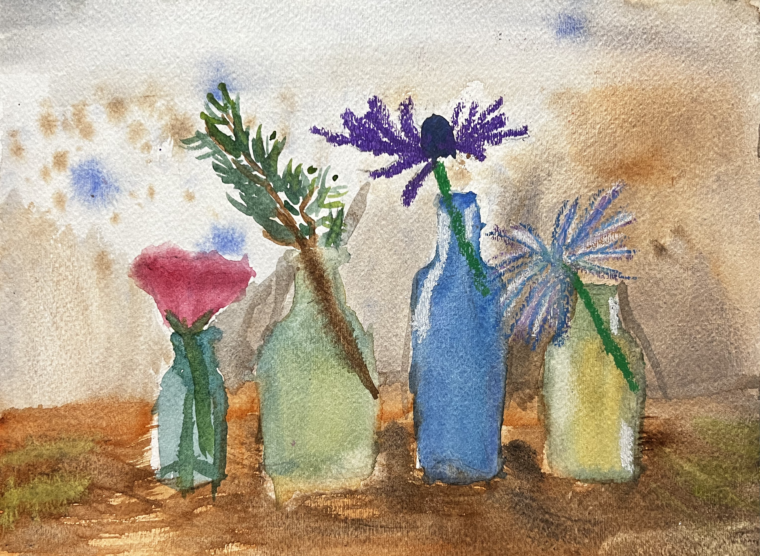 Flowers in glass bottles