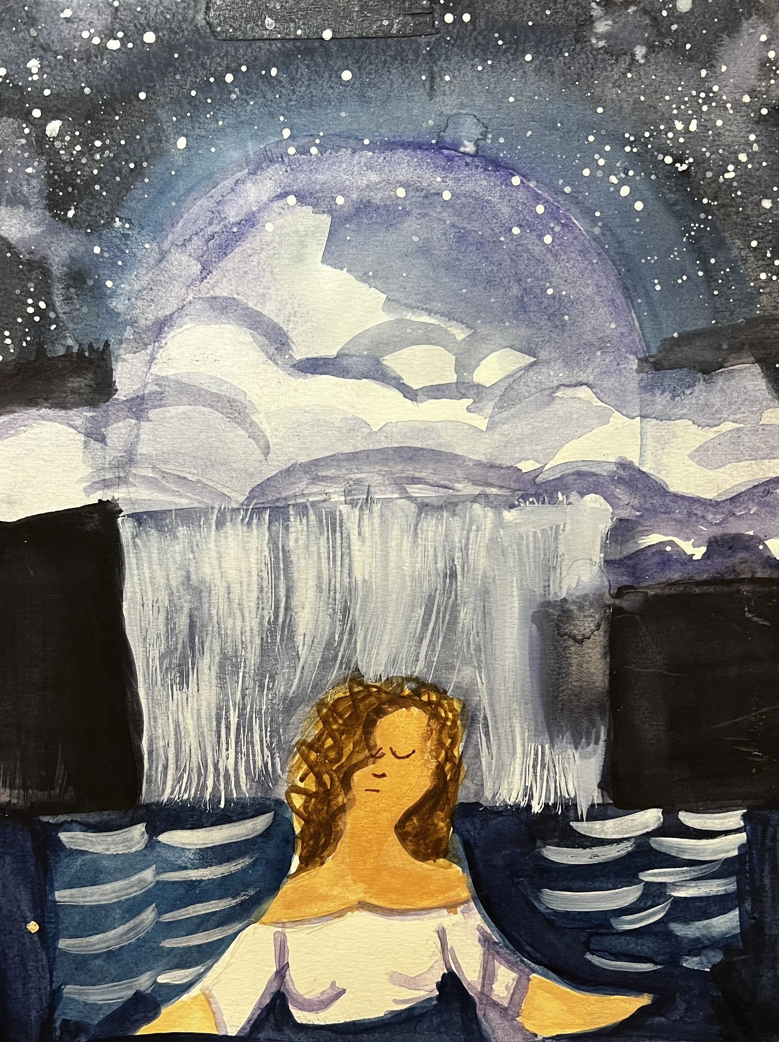 Woman in fron of a waterfall