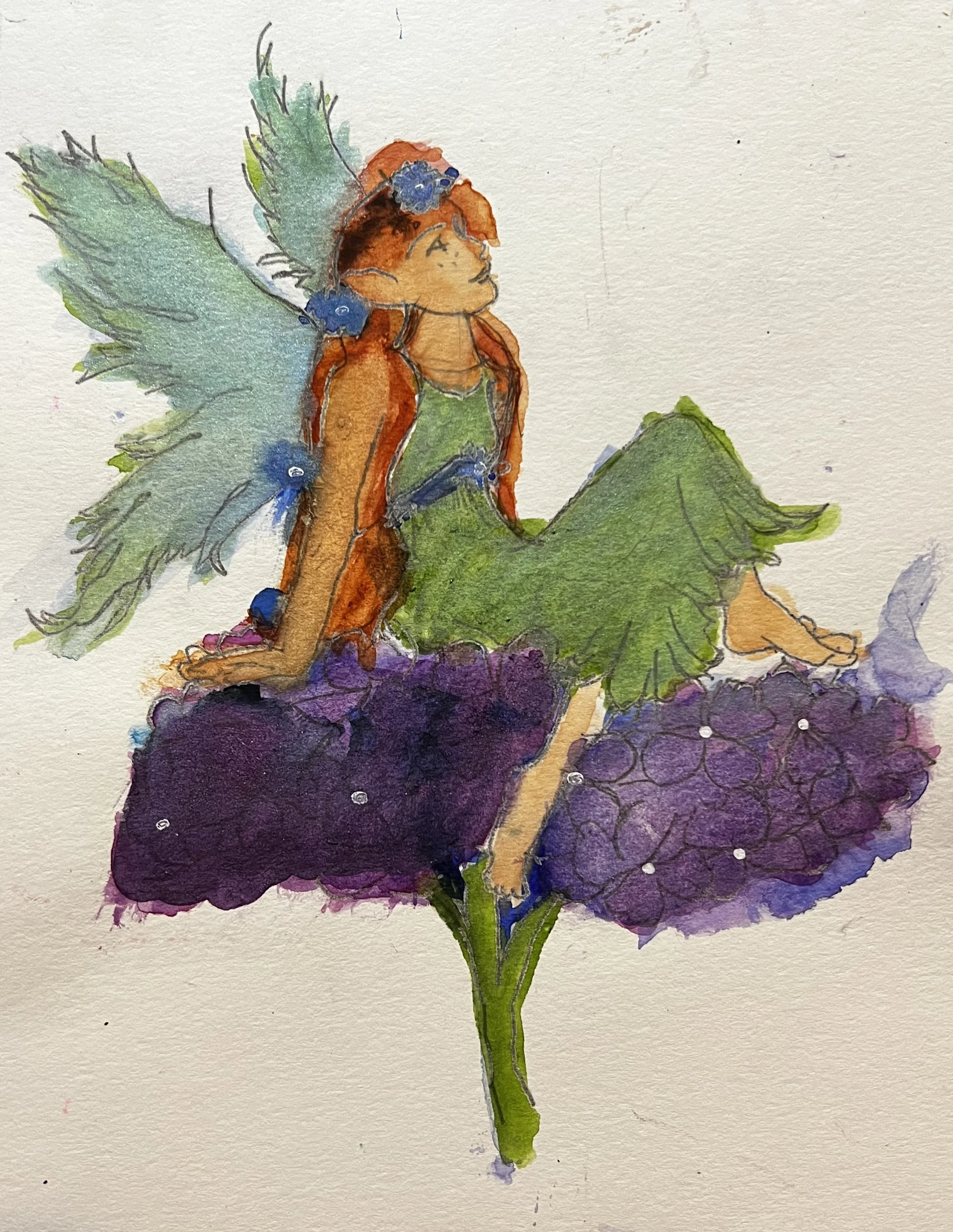 Fairy sitting on a flower