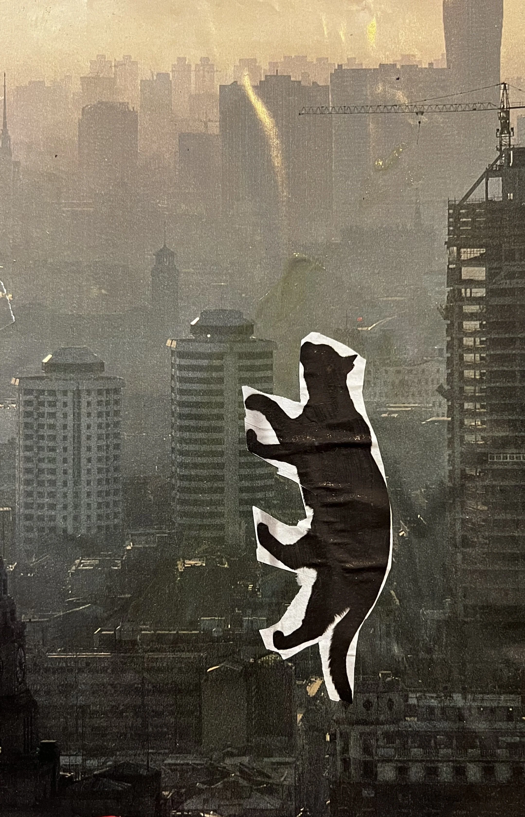 Collage of a cat scaling a skyscraper