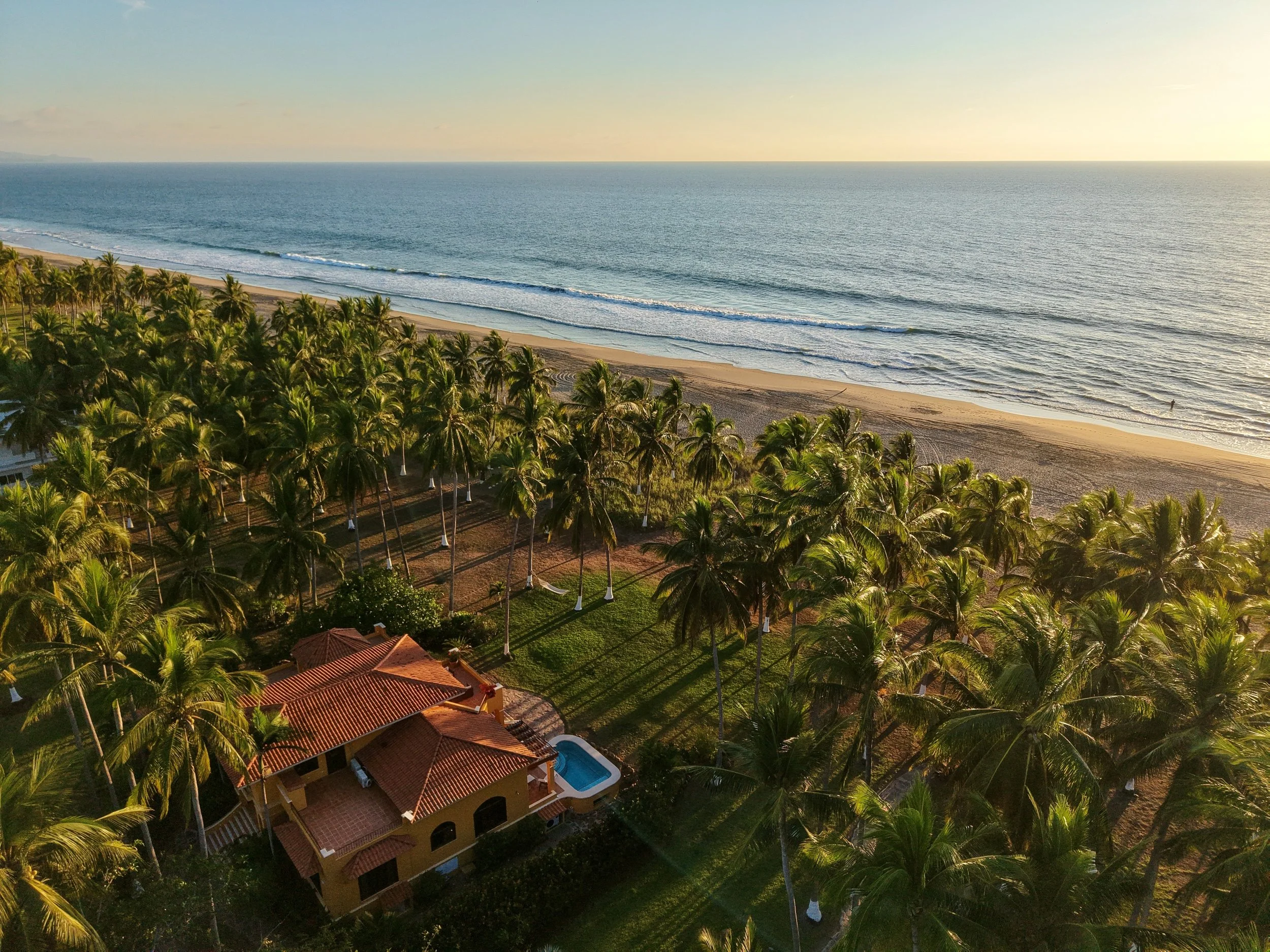 One of the only villas directly on the beach, including a pool